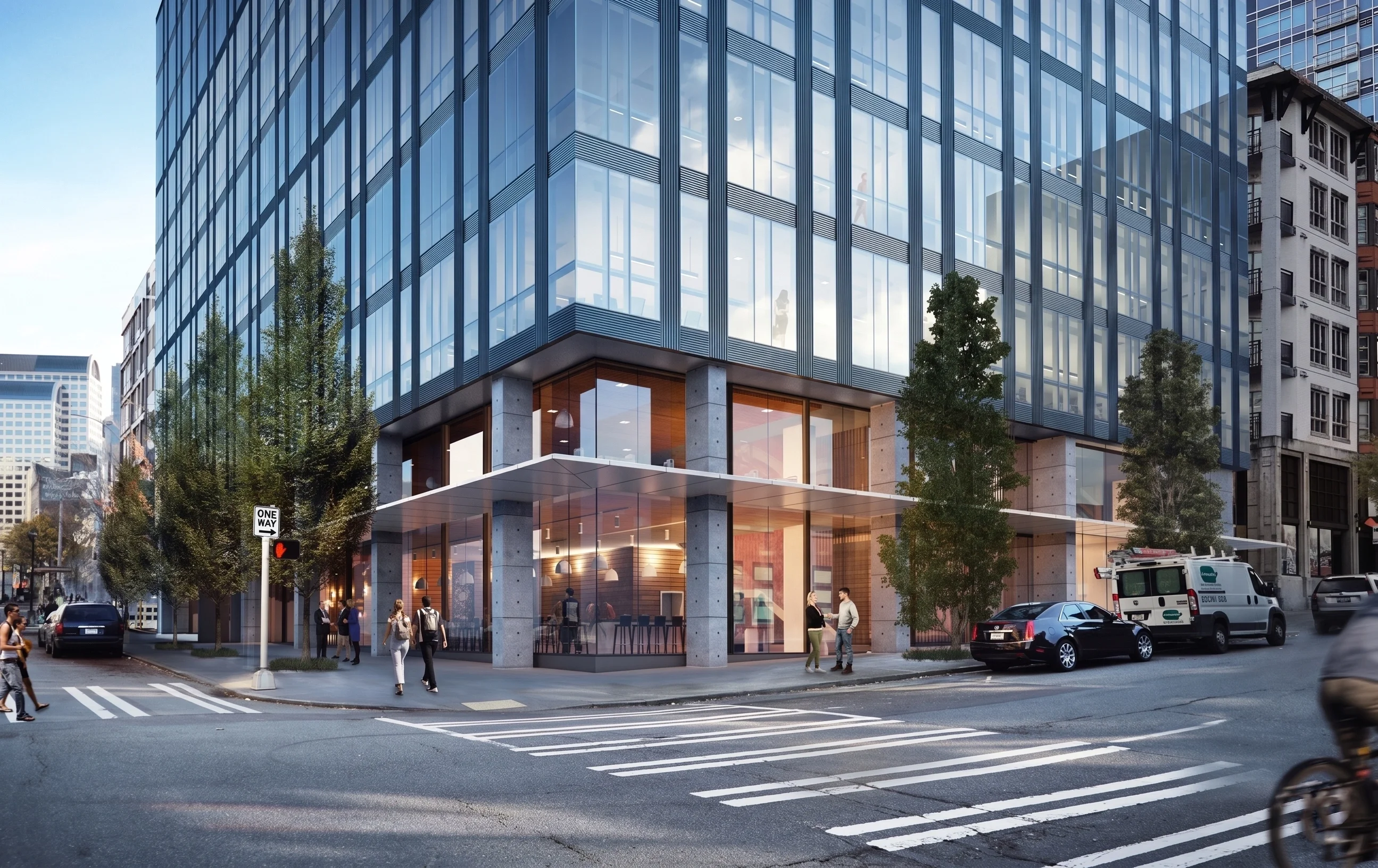 A modern high rise at ground floor with a glass and vertical metal grid and a metal awning
